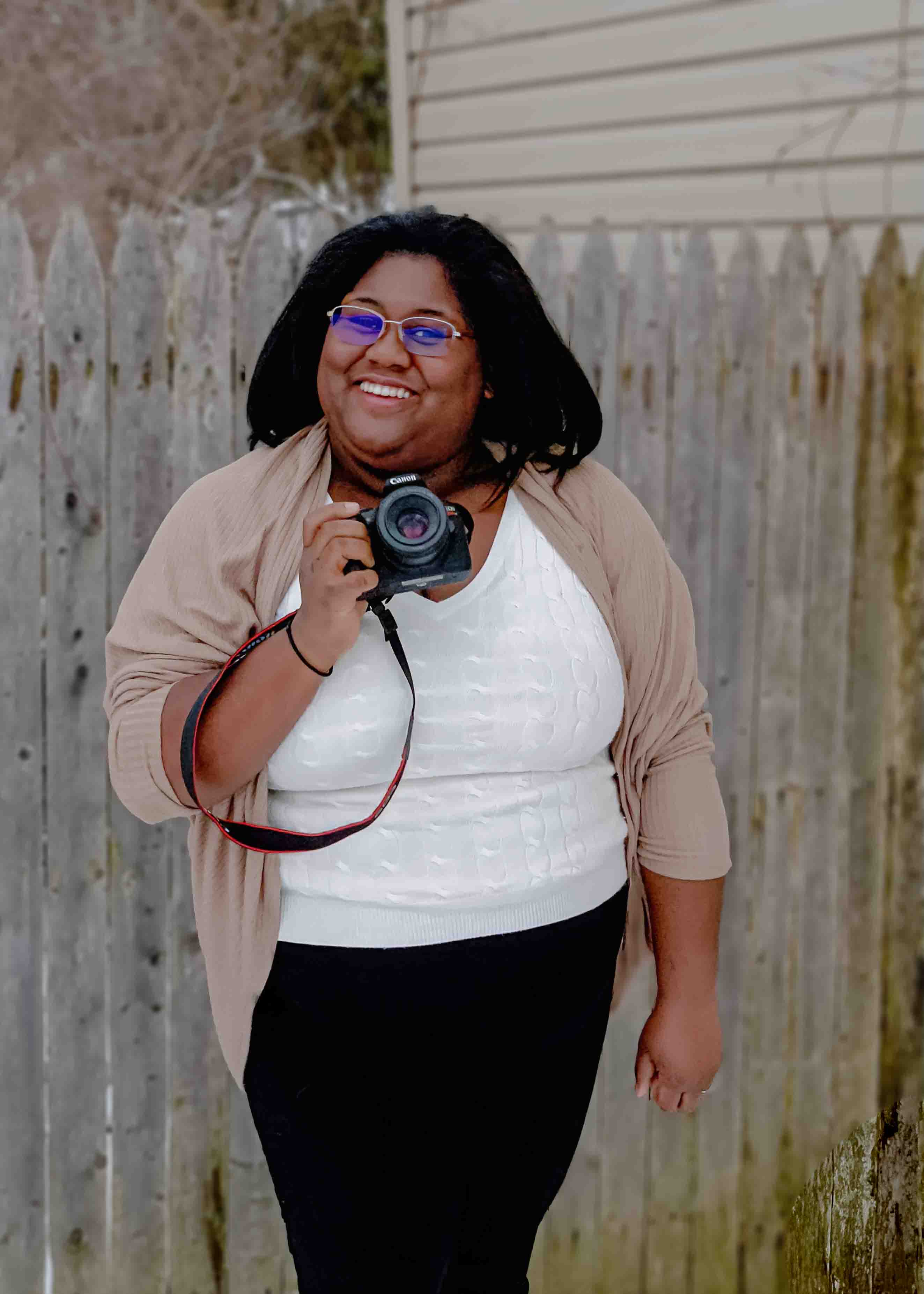 Lead Photographer and company namesake LaDonna Takyi Taylor LT² Photography. Serving Central NY, Northern NY and New England wedding photography.