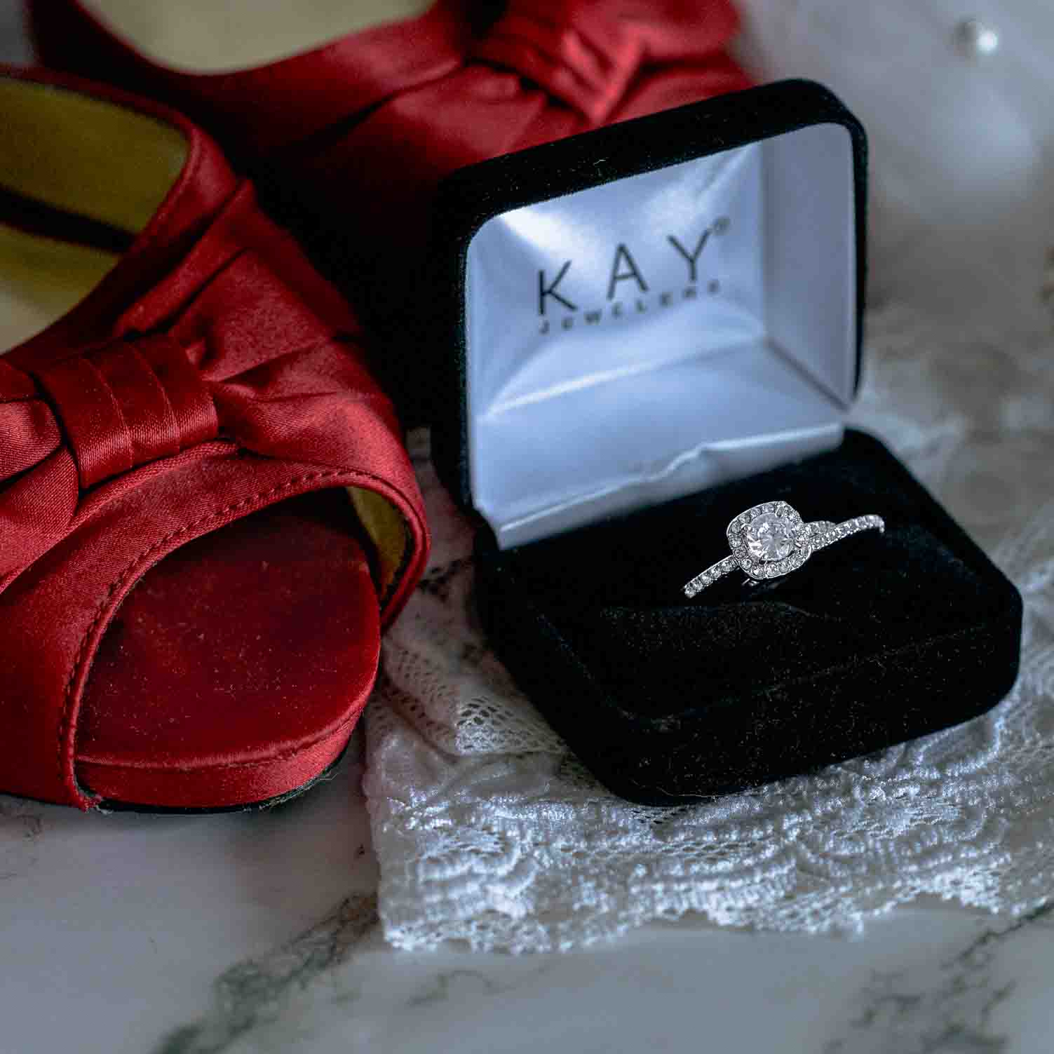 Wedding photography. Canon 100mm macro. Bridal detail image red peep-toe shoes. engagement ring and matching wedding band in Kay Jeweler ring box. Every Kiss Begins with kay
New England Wedding Photographer. Syracuse Wedding Photographer.