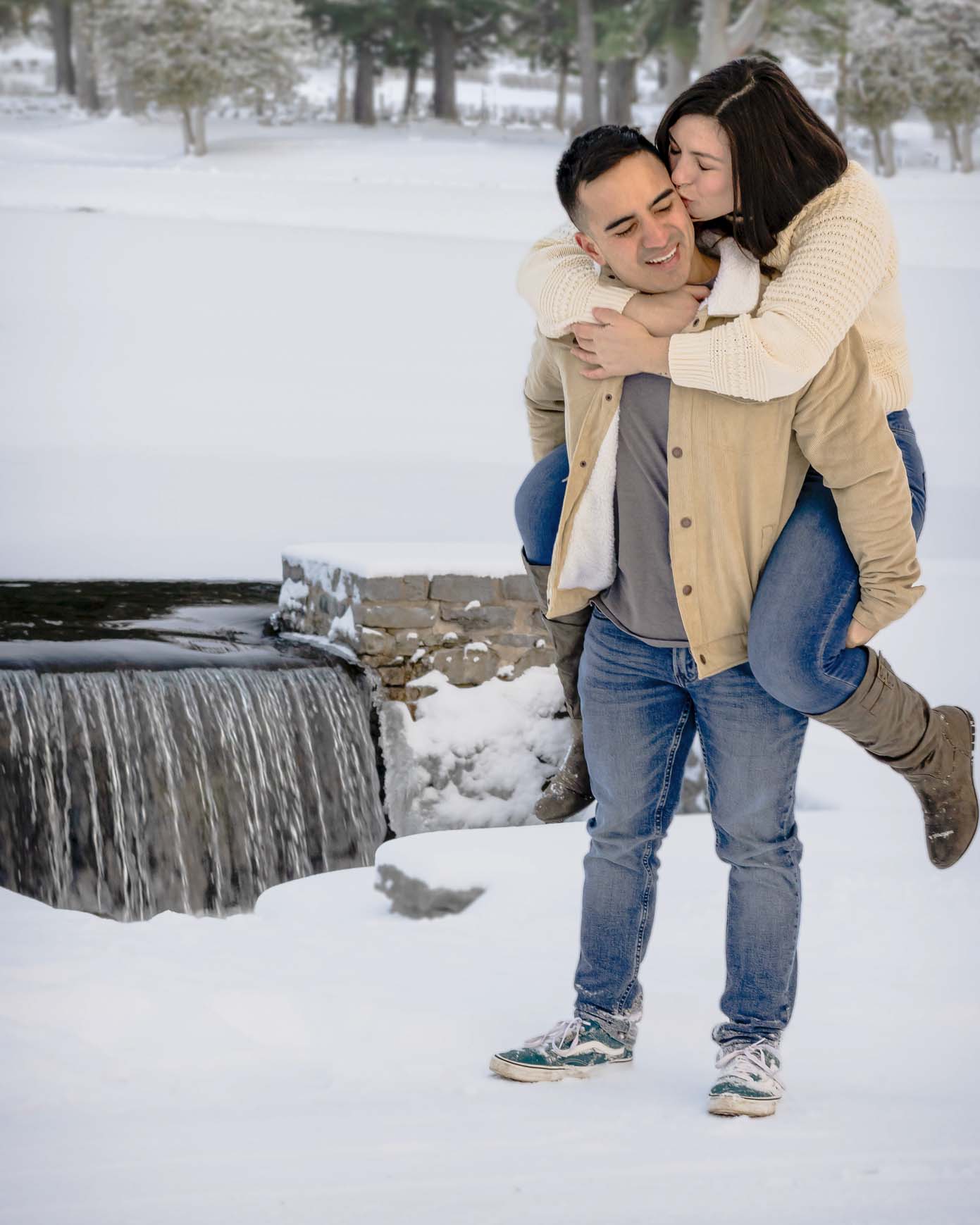 couples portrait photography winter waterfall piggyback Fort Drum NY Watertown NY
