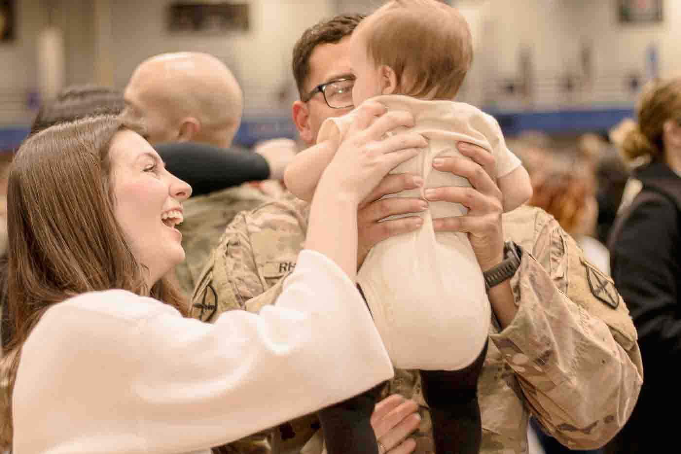 fort drum new york army military soldier and family reunited after long deployment first time meeting baby