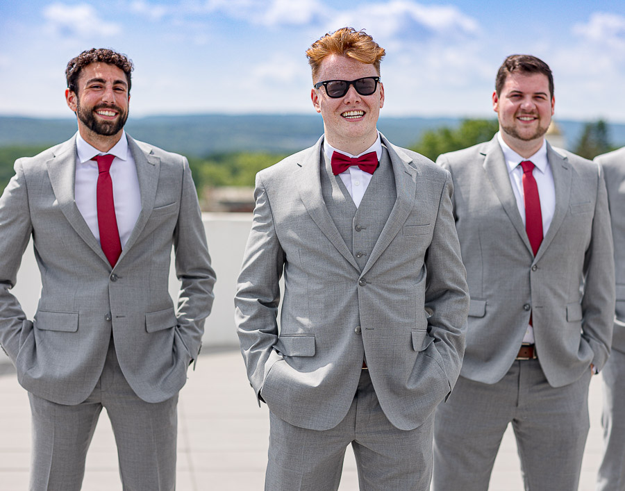 Groomsman power pose. Groom and groomsmen all dressed up ready for the wedding. Adirondack weddings. Albany Brides. Syracuse Wedding photographer. 